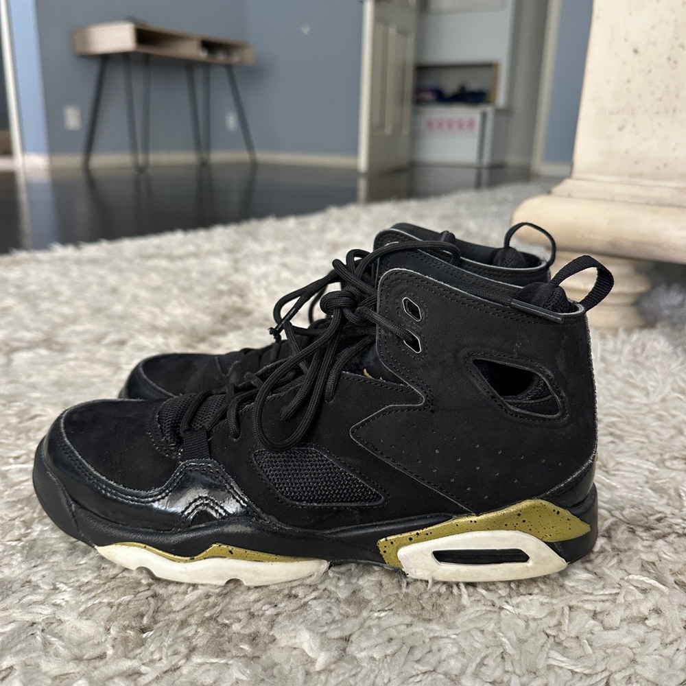 Jordan Black and Gold High-Top Sneakers with Air Unit